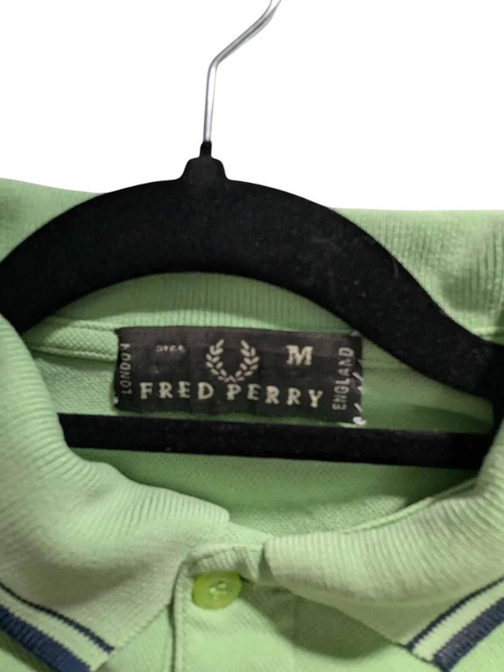 My Store Fred Perry green cotton pique polo shirt featuring a branded neck label and button-up collar