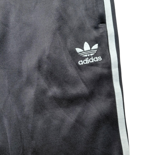 My Store black adidas track pants with white 3 stripe design and embroidered trefoil logo on the leg