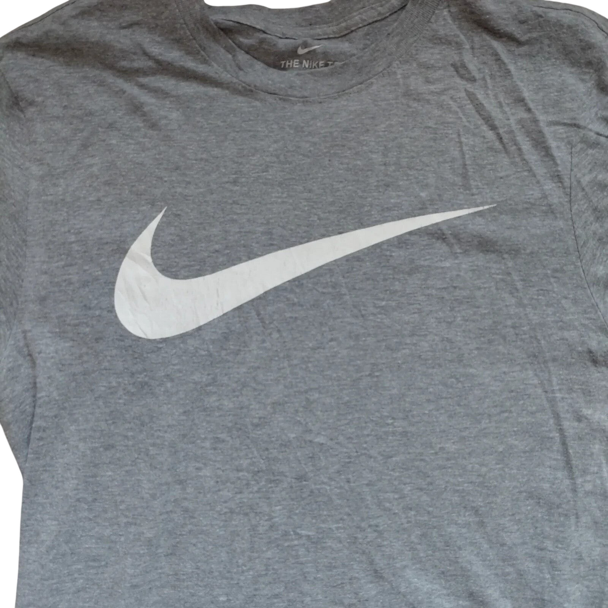 My Store grey Nike crew neck t-shirt with a large white Swoosh logo on the front, size small.