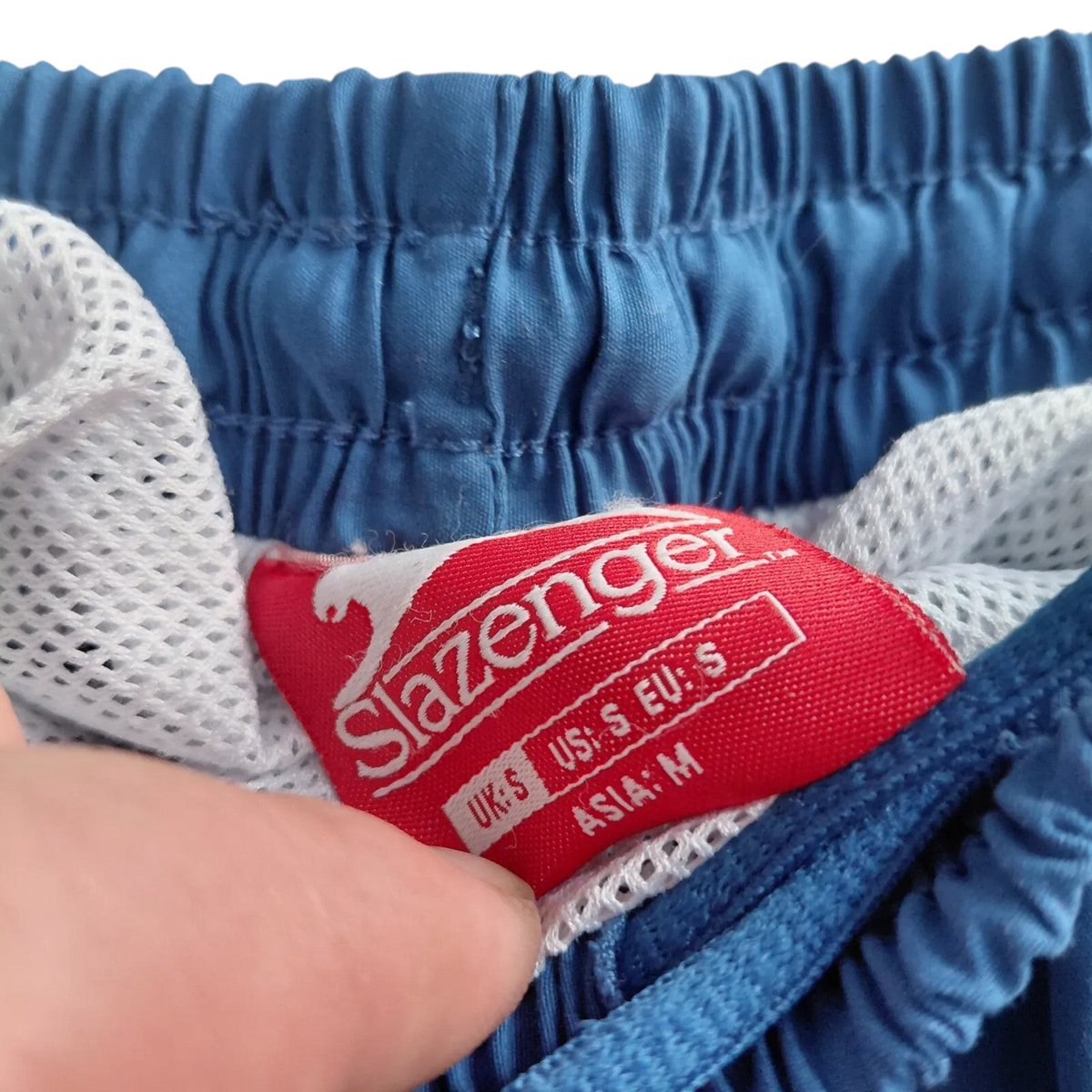 My Store Slazenger blue athletic shorts with drawstring waist and interior white mesh lining, size small label