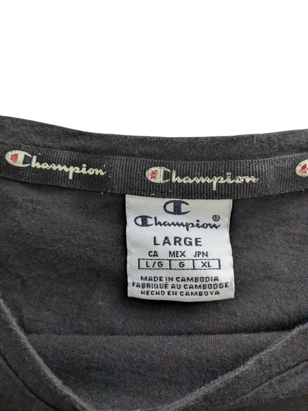 My Store Champion black t-shirt size large neck label with brand logo and care details