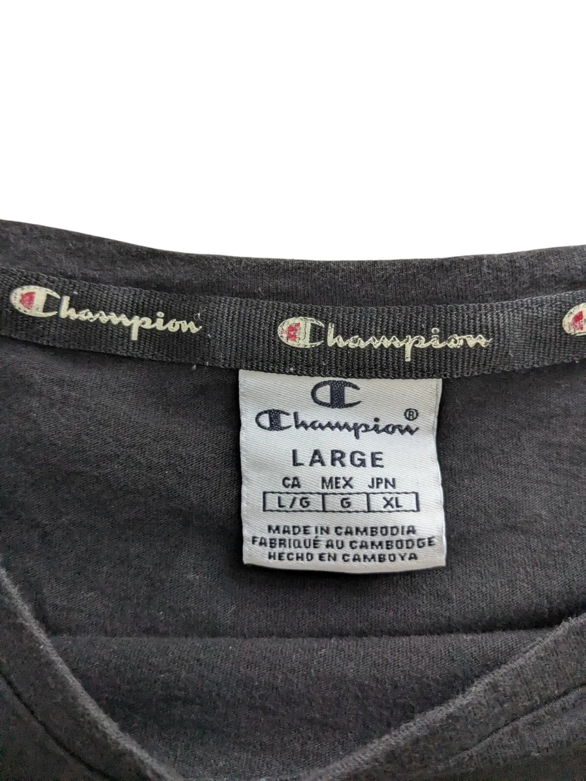My Store Champion black t-shirt size large neck label with brand logo and care details