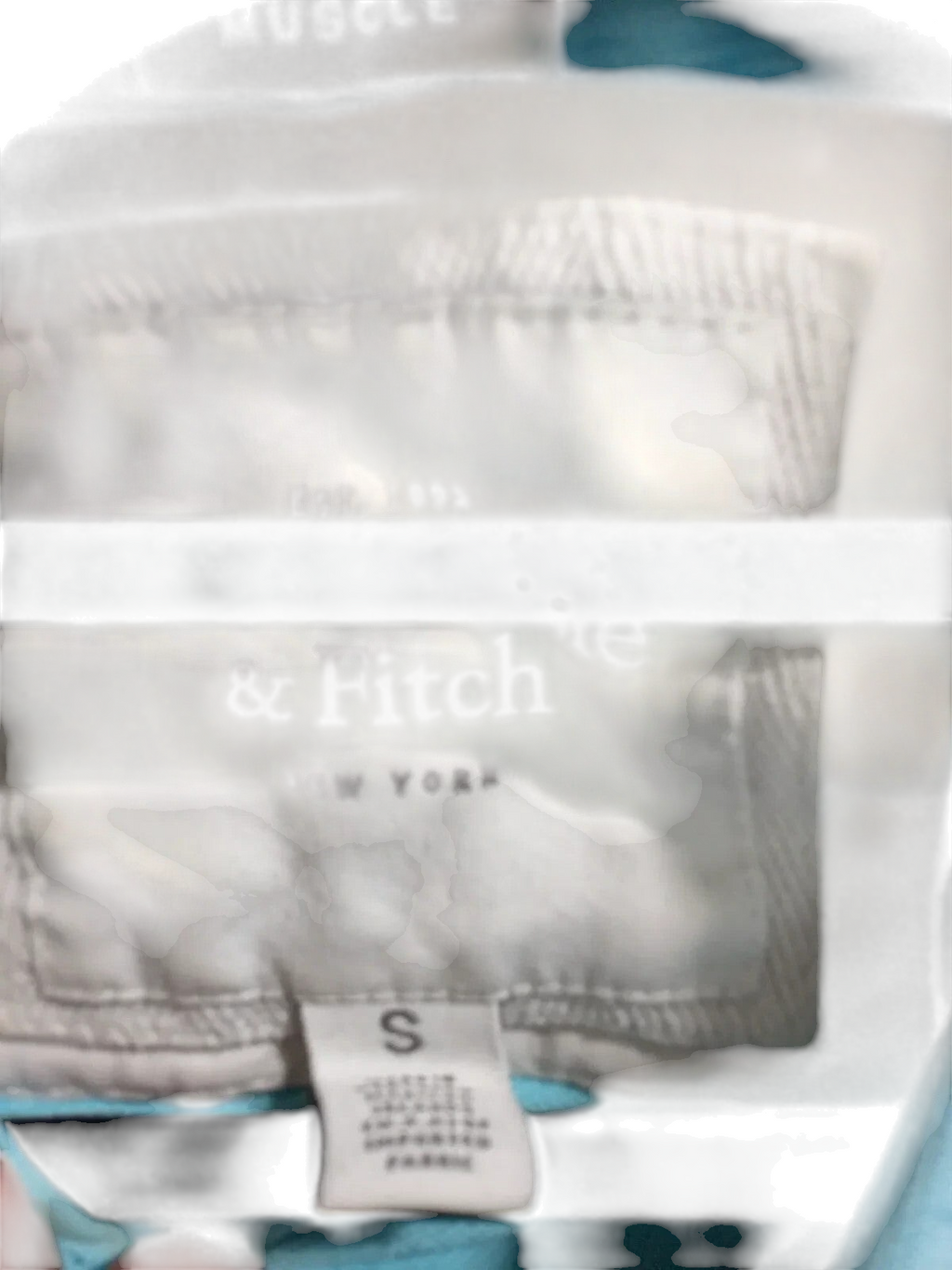My Store Abercrombie & Fitch blue polo shirt size small label detail showing cotton piqué fabric