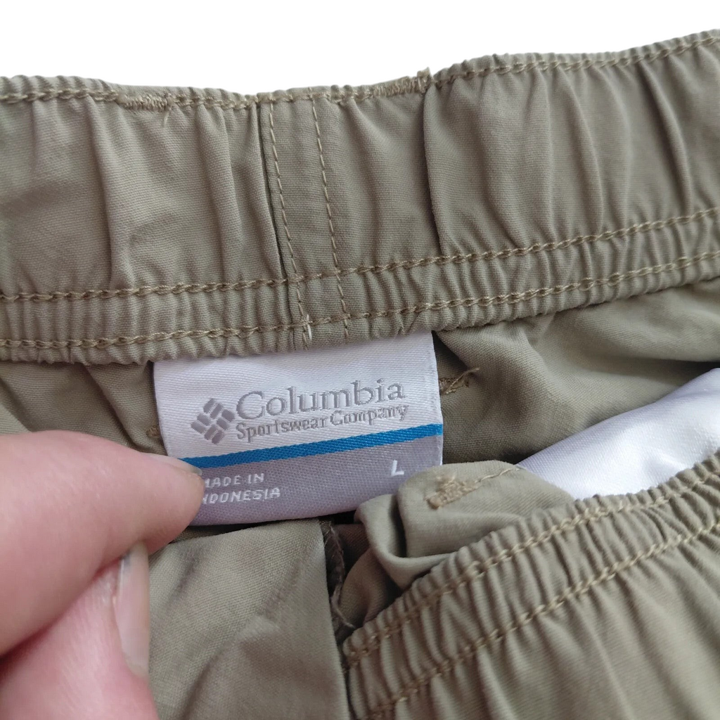 My Store Columbia khaki nylon cargo shorts size large featuring an elastic waistband and brand label detail