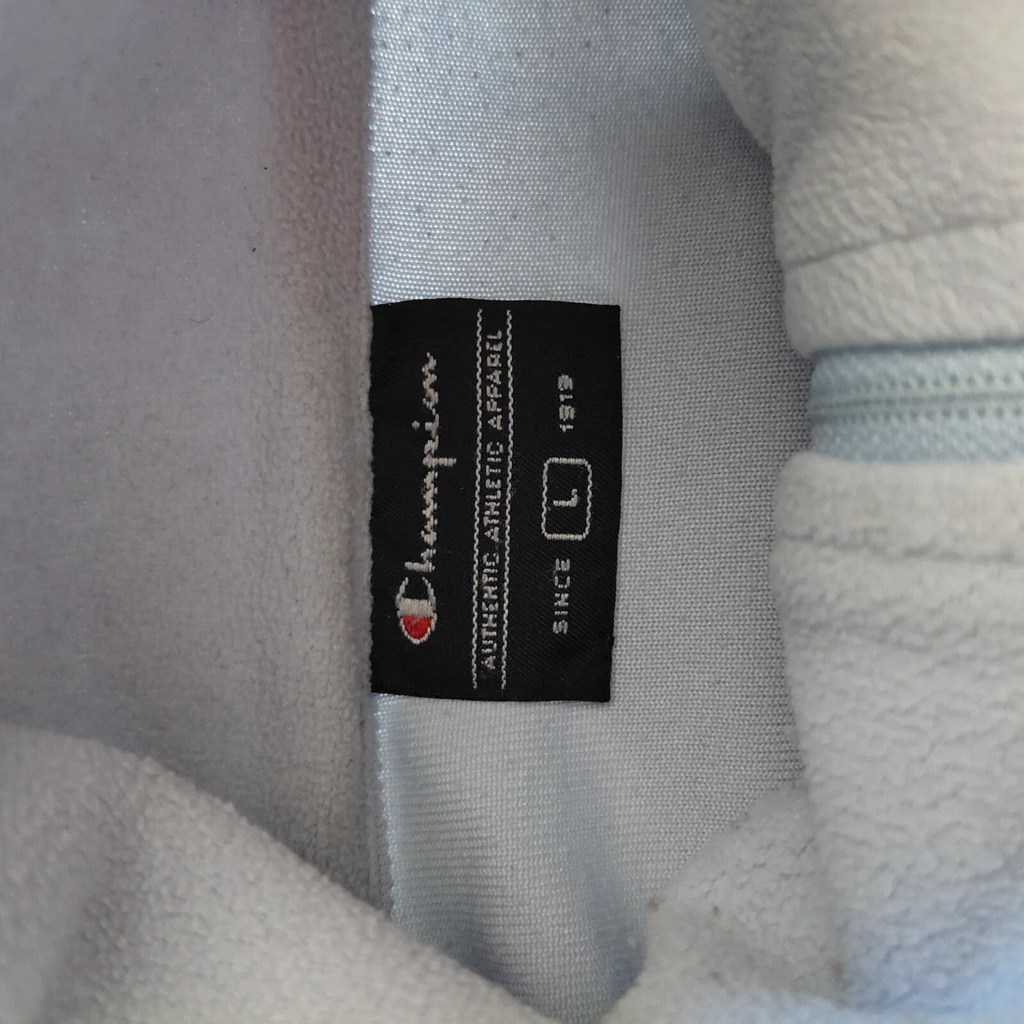 My Store Champion grey fleece 1/4 zip top featuring an authentic embroidered brand label on the inner collar