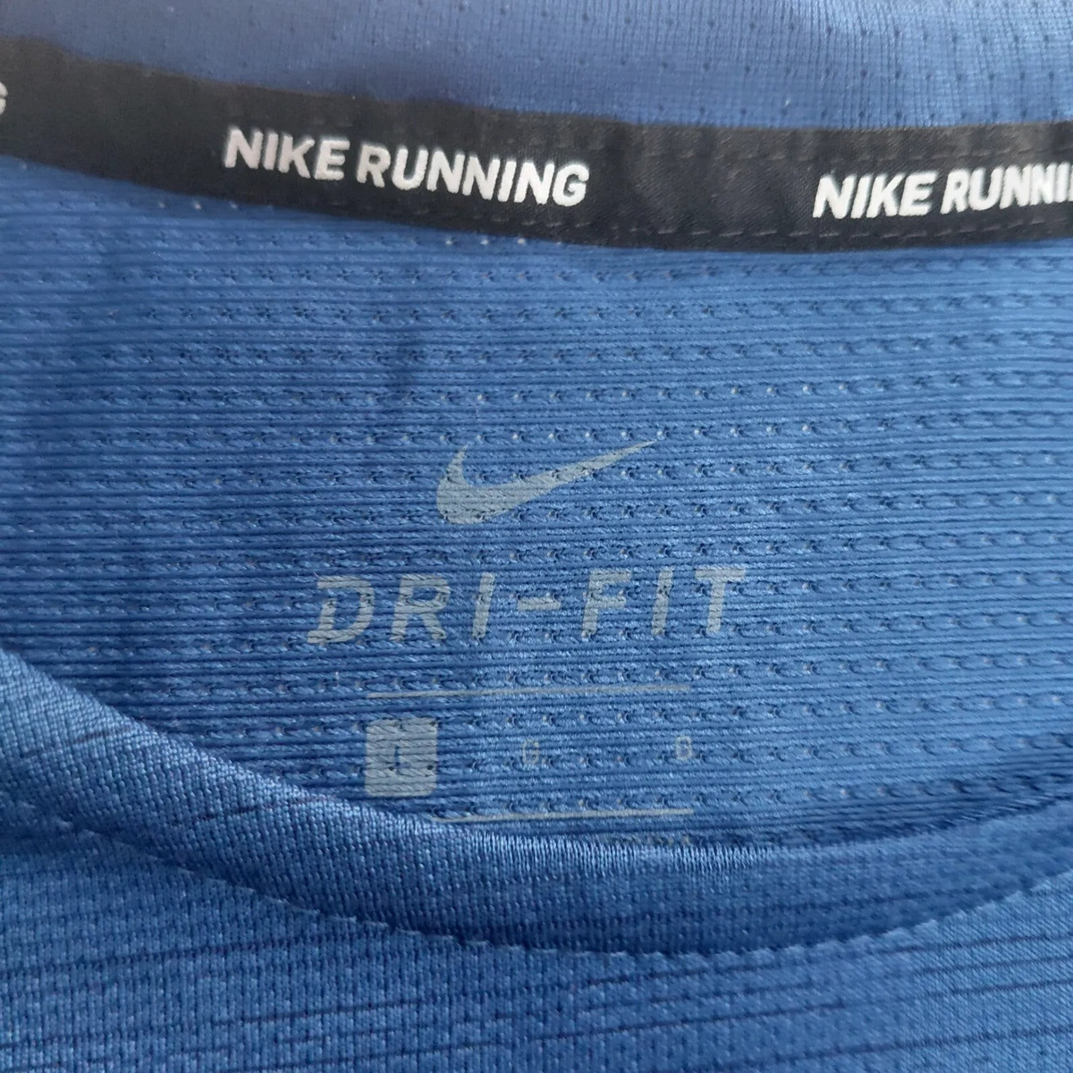 My Store blue Nike Dri-FIT running t-shirt with logo detail and breathable mesh fabric texture