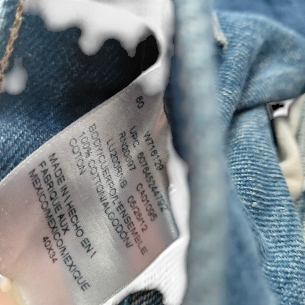 My Store Dickies carpenter jeans interior care label showing 100 percent cotton material and size 40x34