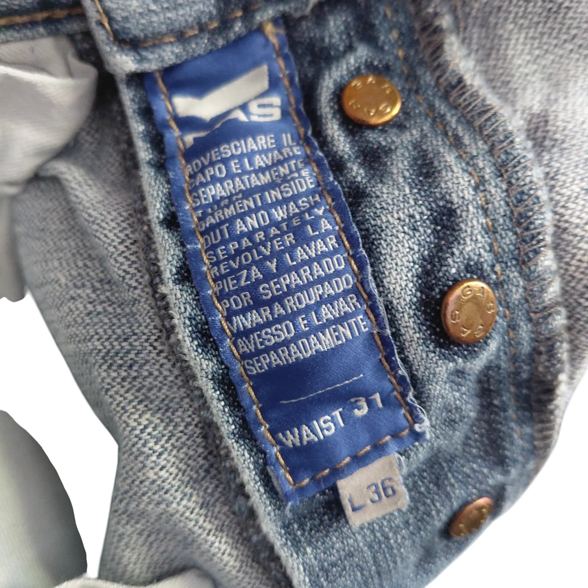 My Store Gas jeans interior care label with size 31 waist and L36 length in light blue denim