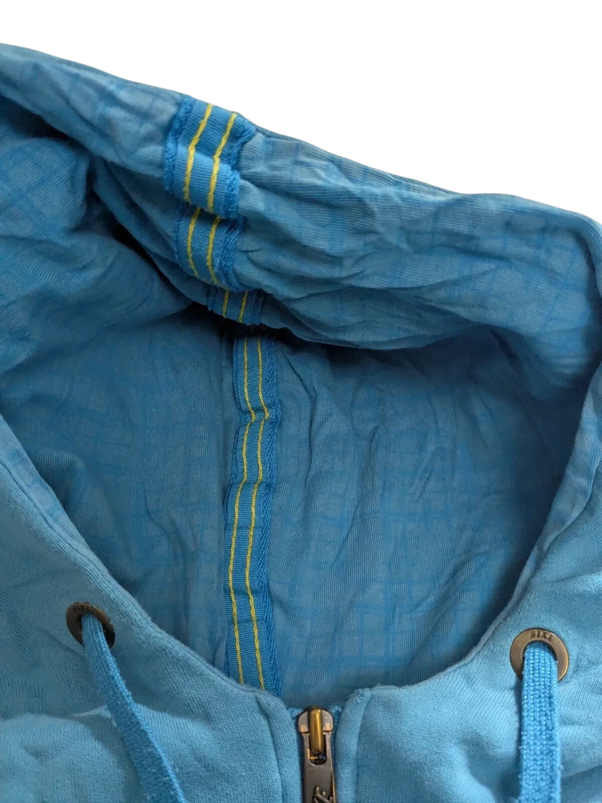 My Store Nike blue cotton quarter zip hoodie featuring yellow interior seam detailing and branded metal eyelets