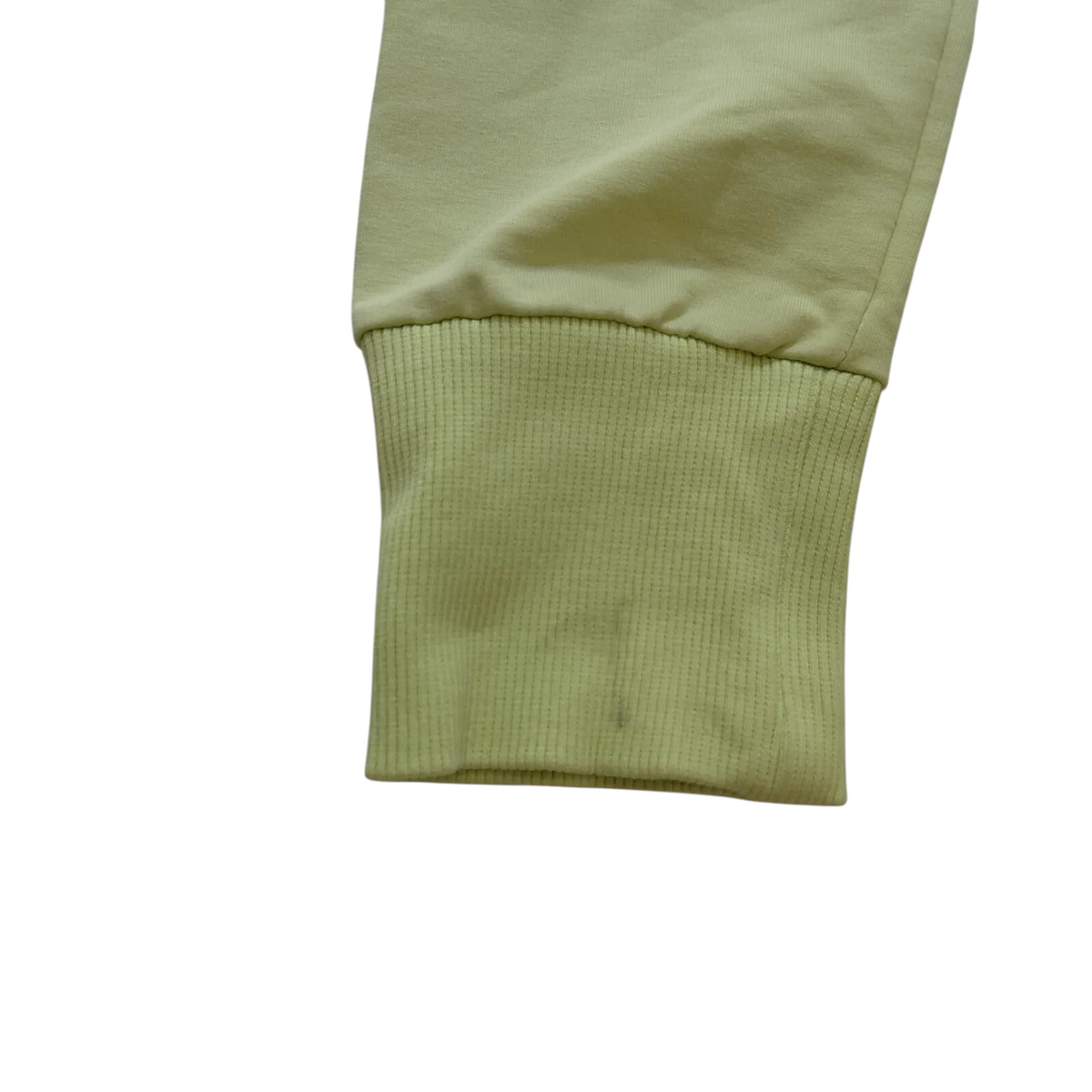 My Store Champion lime green track jacket sleeve cuff with ribbed detail and small mark