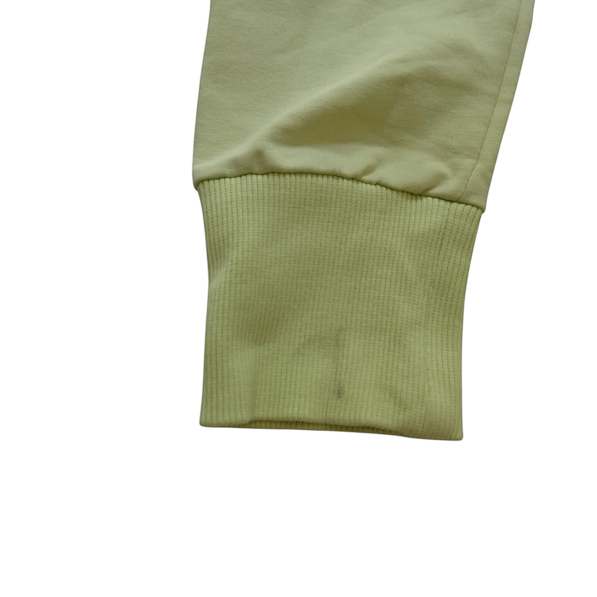 My Store Champion lime green track jacket sleeve cuff with ribbed detail and small mark