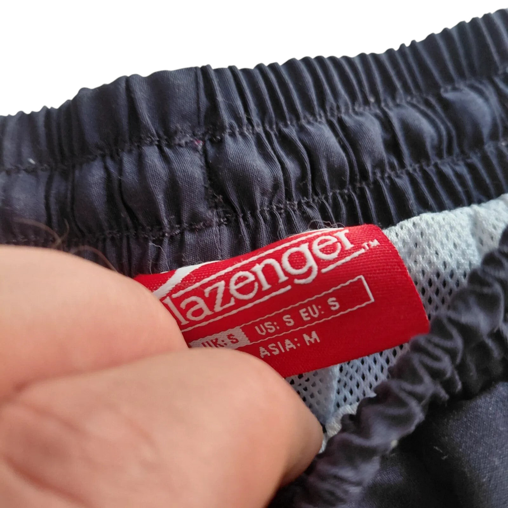 My Store Slazenger navy athletic shorts featuring an elastic waistband and white mesh lining, size small label detail