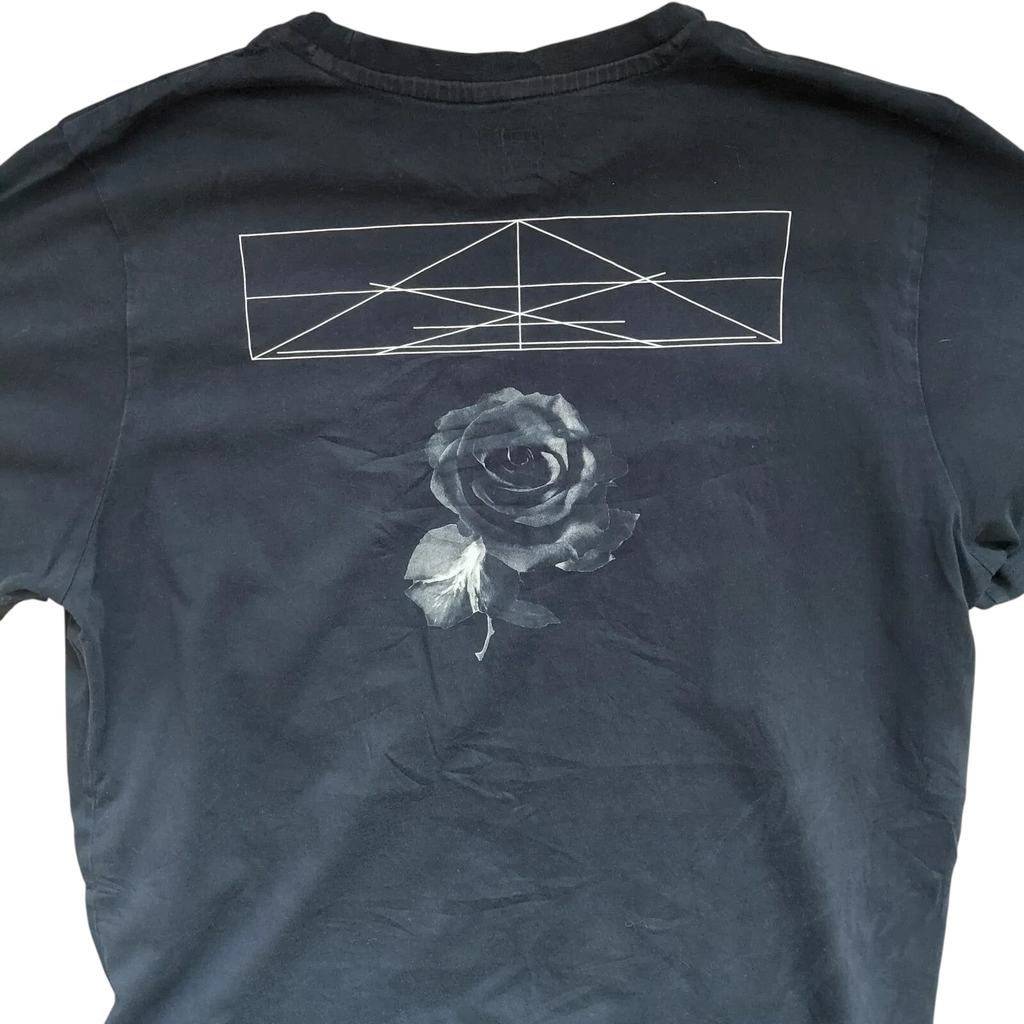 My Store black Puma crew neck t-shirt featuring a white geometric line graphic and a rose print on the back