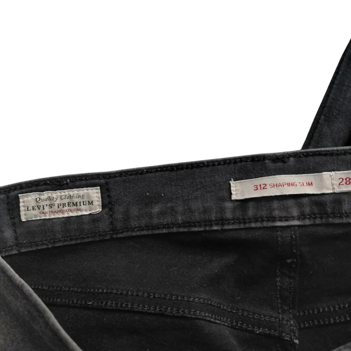 My Store Levi's 312 Shaping Slim black denim jeans waistband with brand labels and size 28 tag