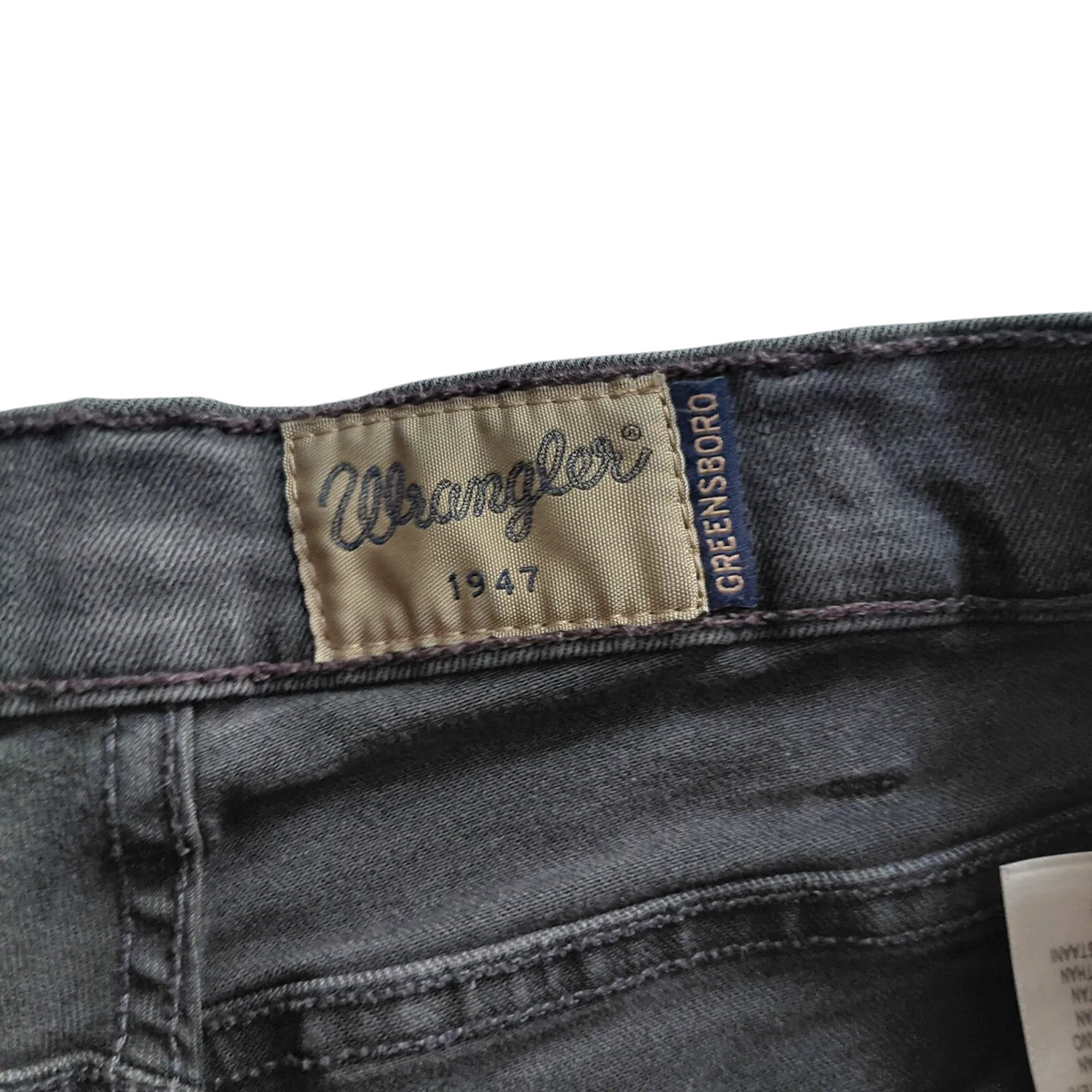 My Store Wrangler Greensboro grey denim jeans featuring the iconic brand logo patch on the back waistband
