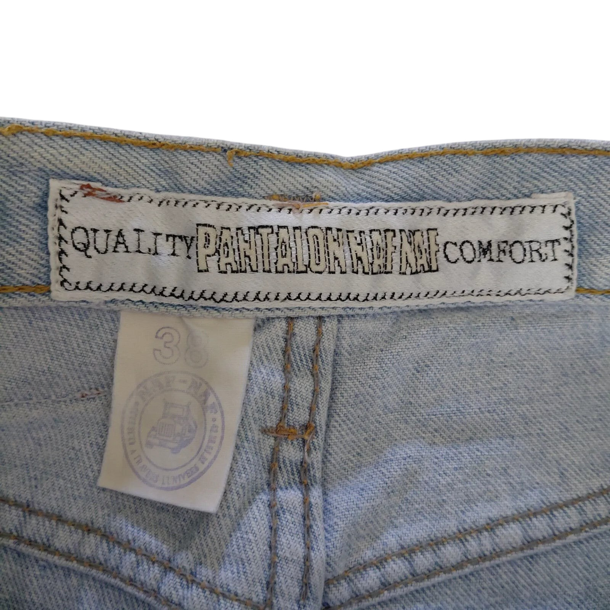 My Store Naf Naf light blue denim shorts label and size tag showing quality comfort branding