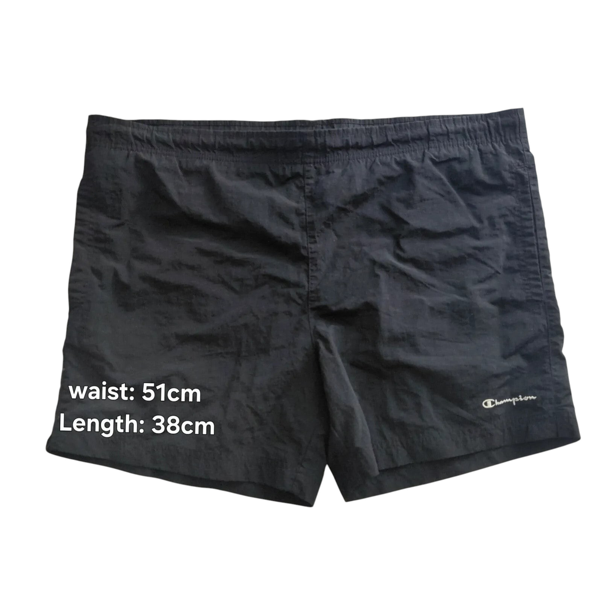 My Store black Champion athletic shorts with an elastic waistband and small logo detail on the leg.