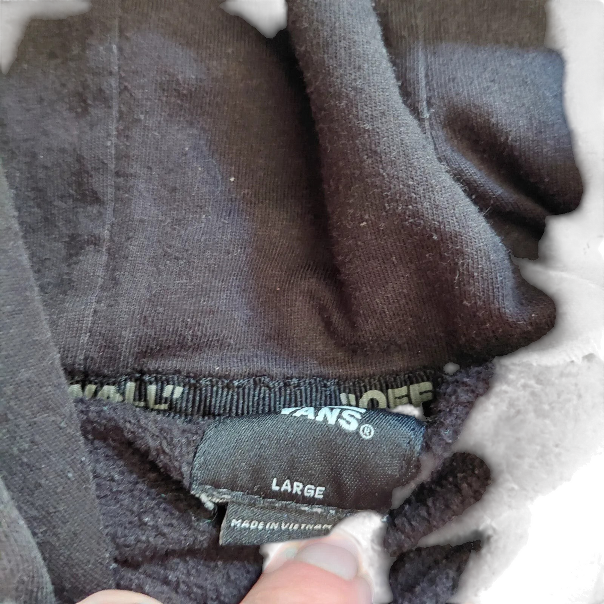 My Store Vans black pullover hoodie with size large label and interior neck branding detail