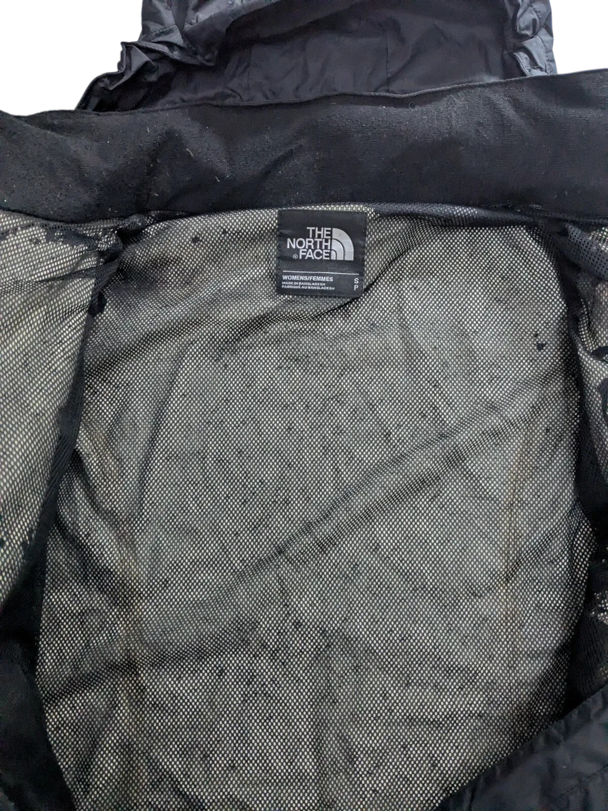 My Store The North Face womens black waterproof shell jacket interior showing mesh lining and size small brand label