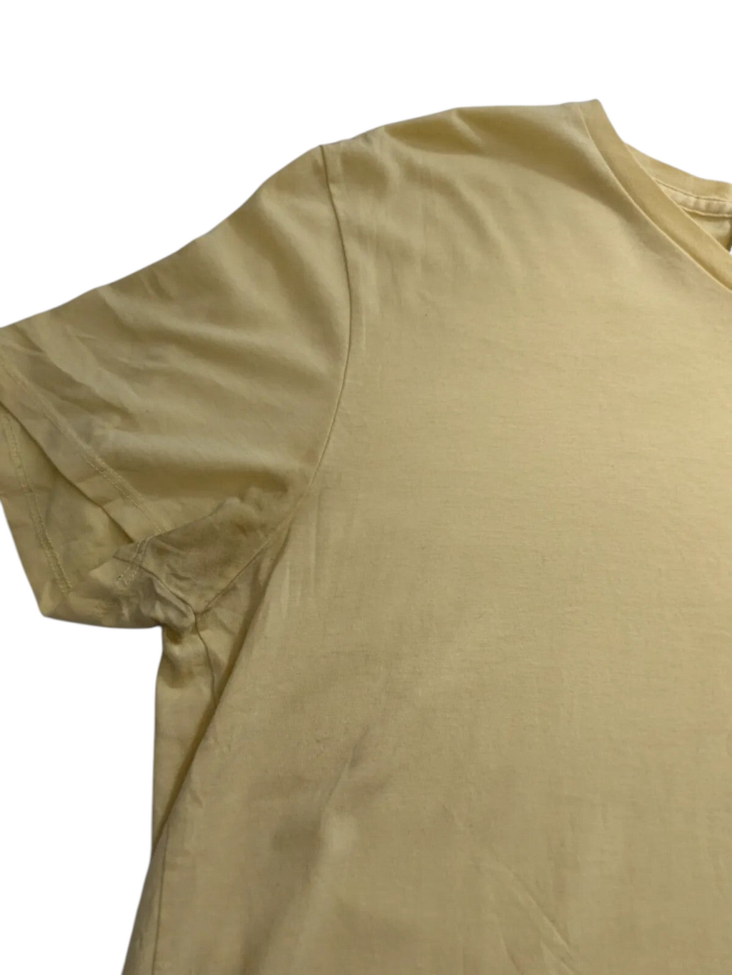 My Store yellow Lacoste cotton V-neck t-shirt showing underarm wear and fabric detail