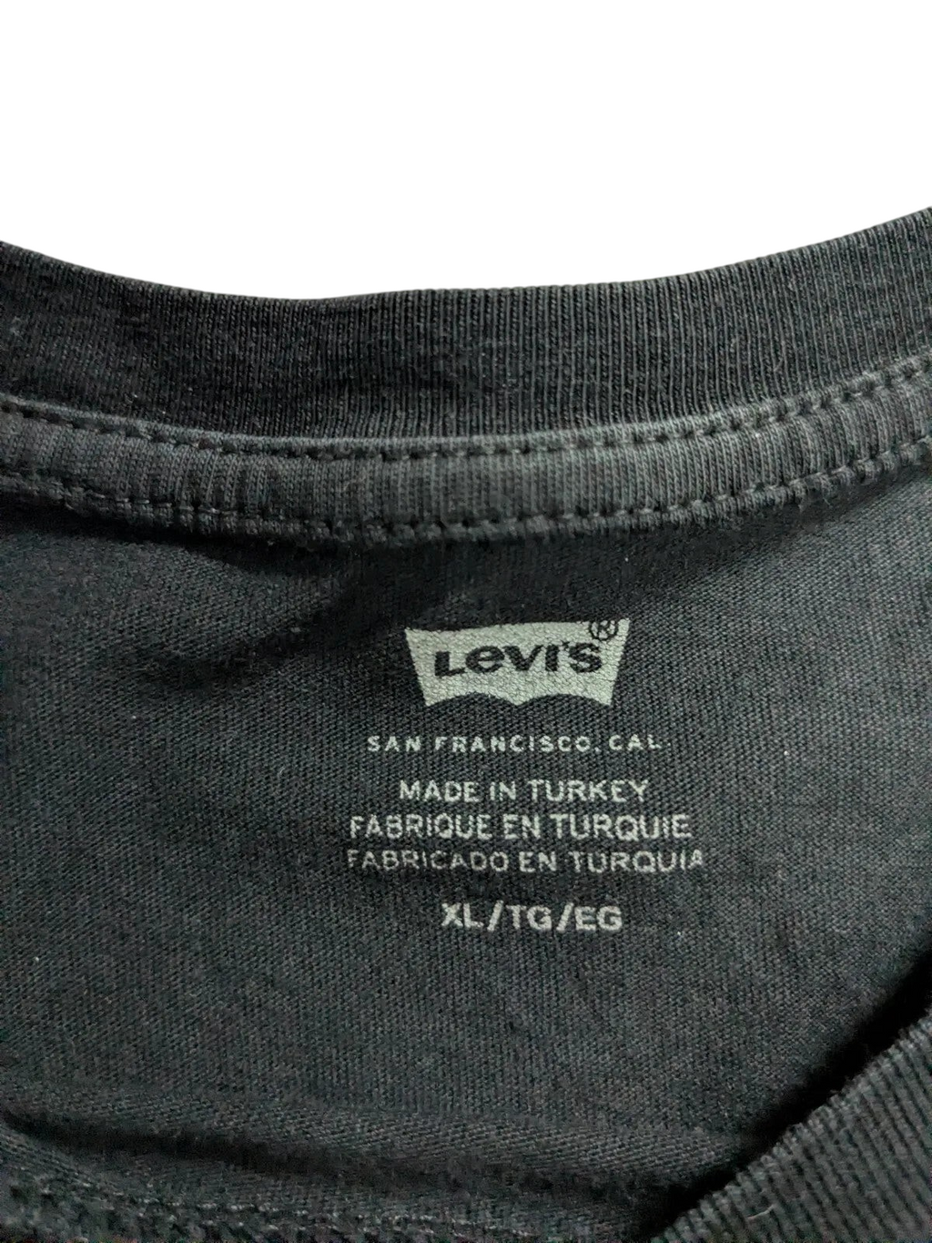 My Store black Levi's cotton t-shirt inner neck label showing size XL and San Francisco branding