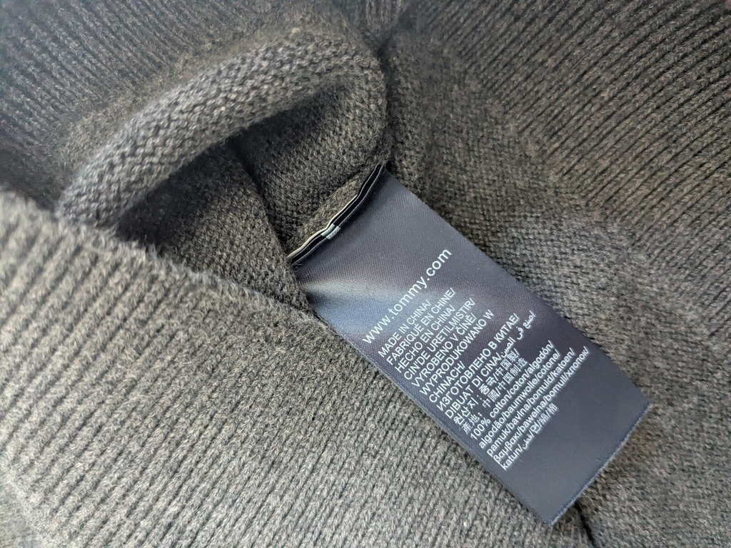 My Store Tommy Hilfiger gray cotton sweater interior care label showing fabric composition and origin