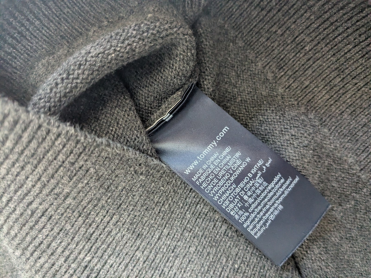 My Store Tommy Hilfiger gray cotton sweater interior care label showing fabric composition and origin