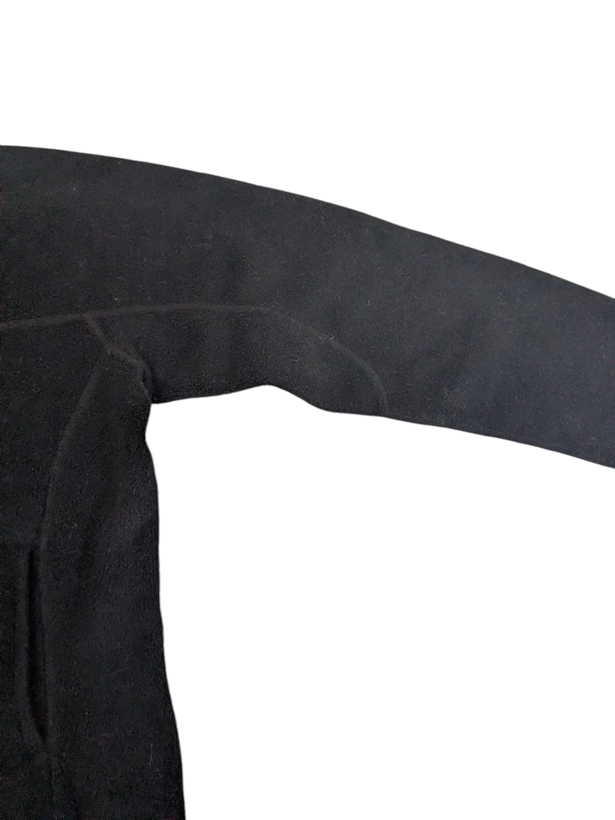 My Store Patagonia Synchilla black polyester fleece pullover sleeve detail showing soft fabric texture