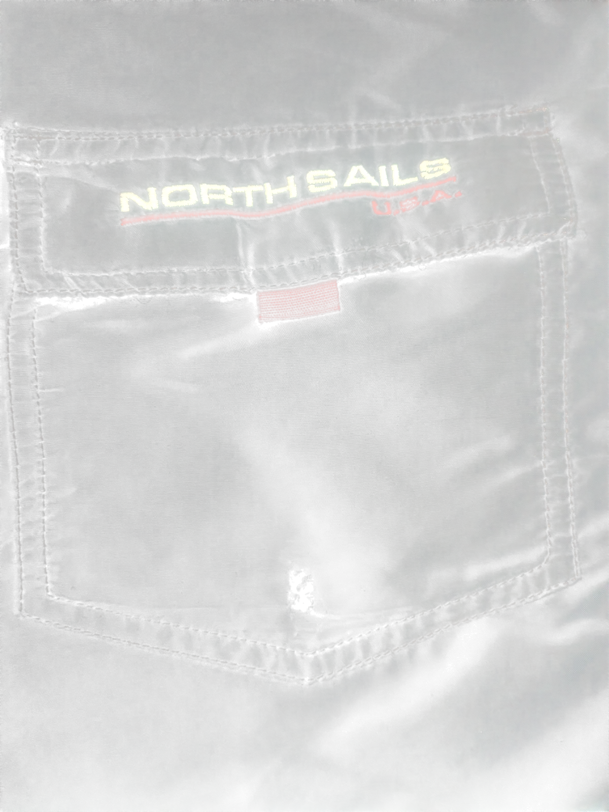 My Store North Sails black and pink swim shorts back pocket detail with embroidered logo and small fabric hole