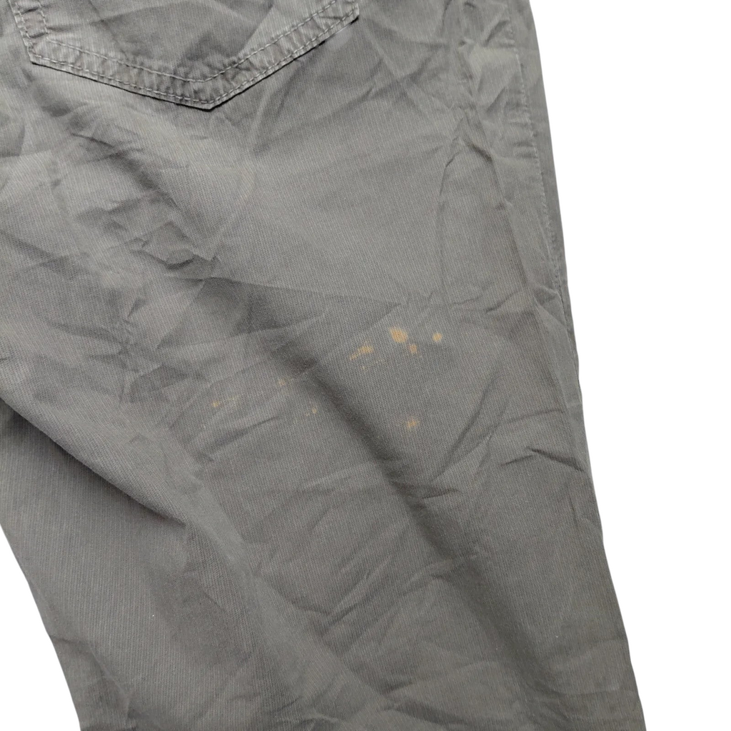 My Store MCS Marlboro Classics olive green cargo pants showing fabric staining on the leg