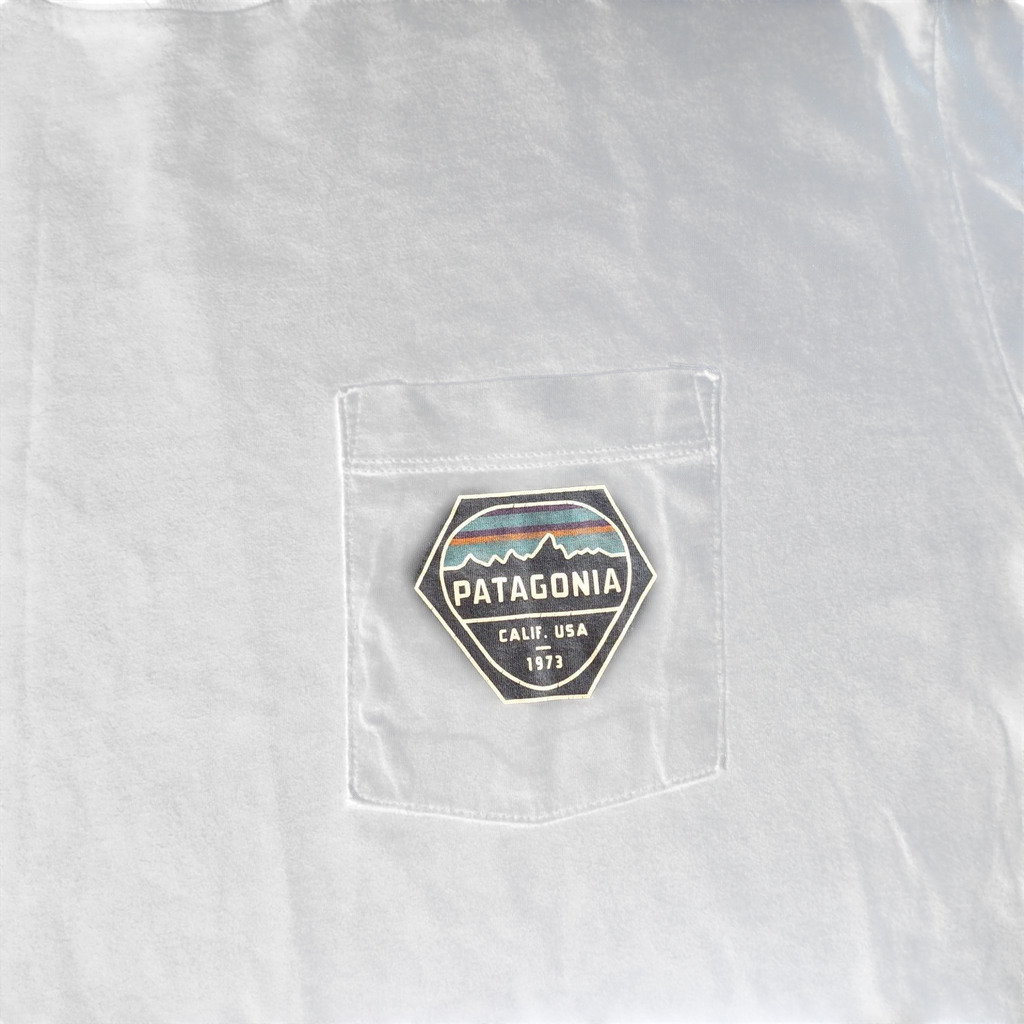 My Store navy Patagonia organic cotton crew neck t-shirt featuring a graphic logo on the chest pocket