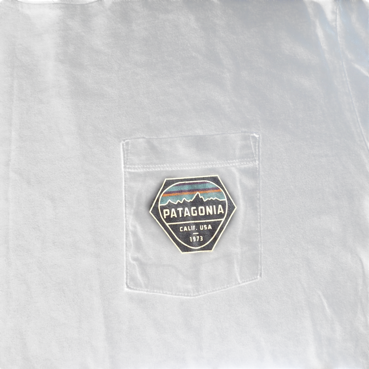 My Store navy Patagonia organic cotton crew neck t-shirt featuring a graphic logo on the chest pocket