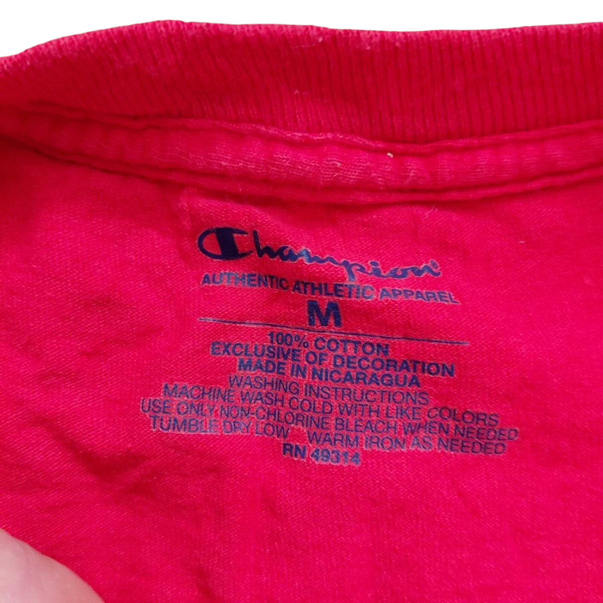 My Store Champion red cotton crew neck t-shirt size medium interior neck label with care instructions