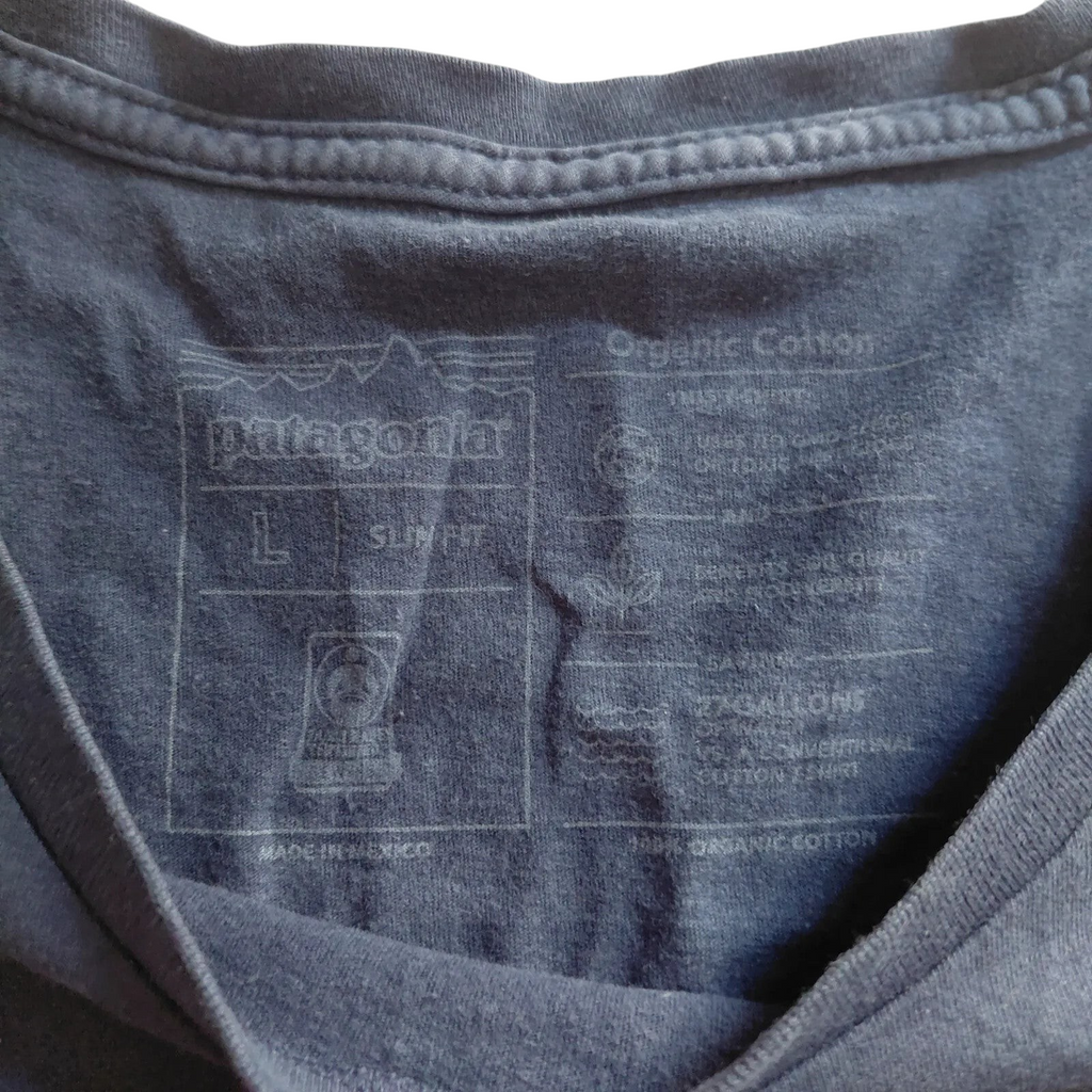 My Store Patagonia navy organic cotton t-shirt interior neck label with size medium and graphic print details