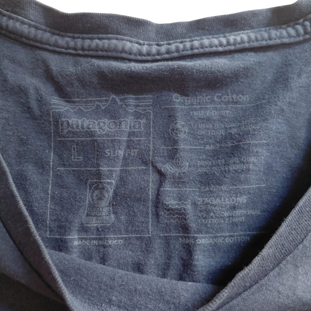My Store Patagonia navy organic cotton t-shirt interior neck label with size medium and graphic print details