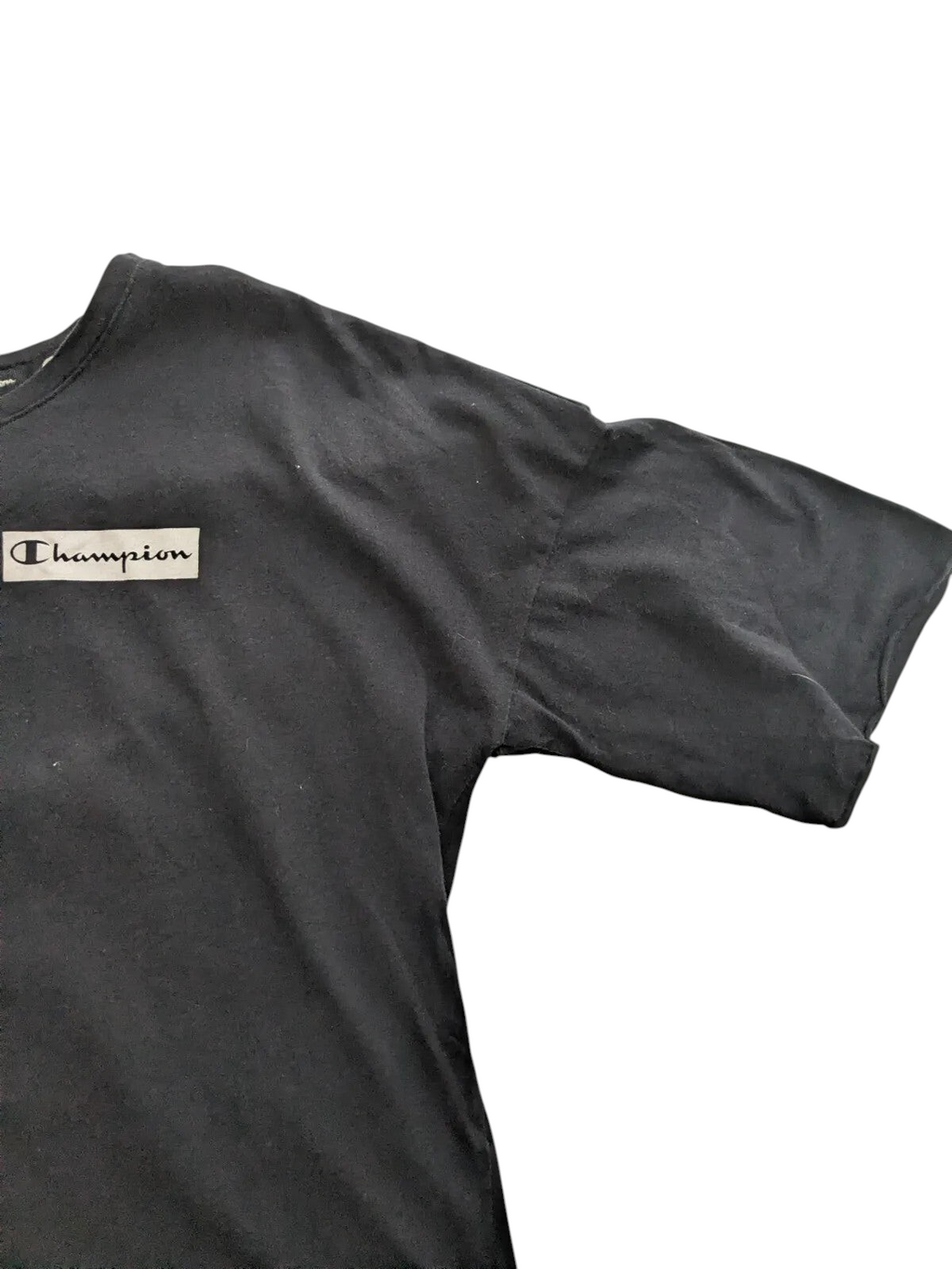 My Store pre-owned black Champion t-shirt with a rectangular logo patch on the chest, size large.
