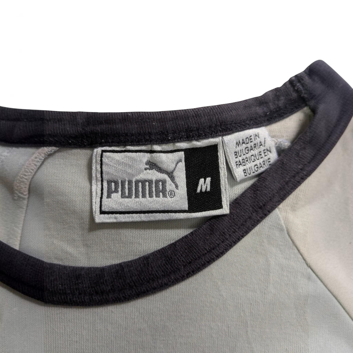 My Store Puma grey football shirt size M label detail with crew neck and raglan sleeve stitching