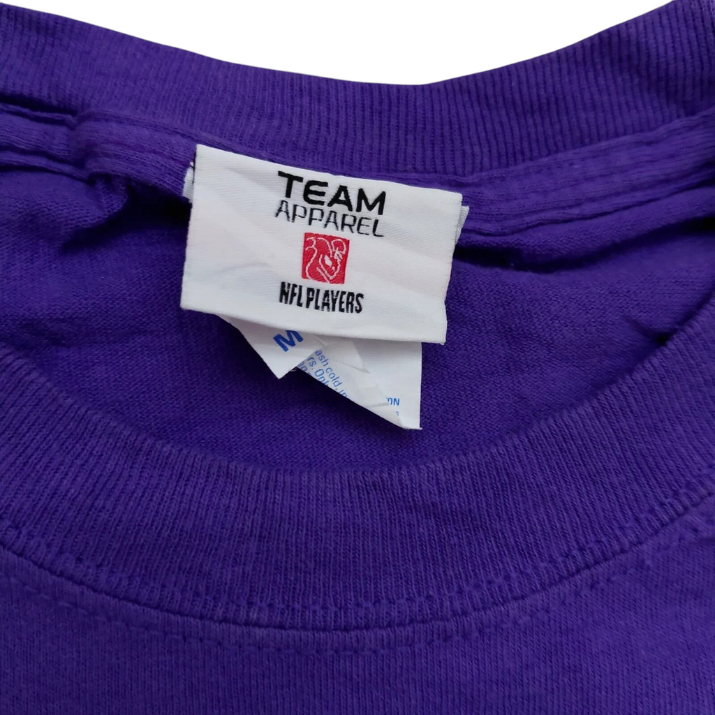 My Store Team Apparel purple Vikings NFL football t-shirt neck label showing size medium and NFL Players logo