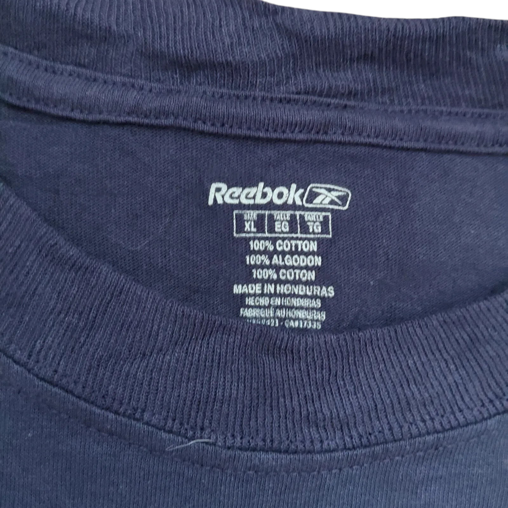 My Store Reebok navy blue cotton t-shirt interior neck label showing size XL and 100 percent cotton material