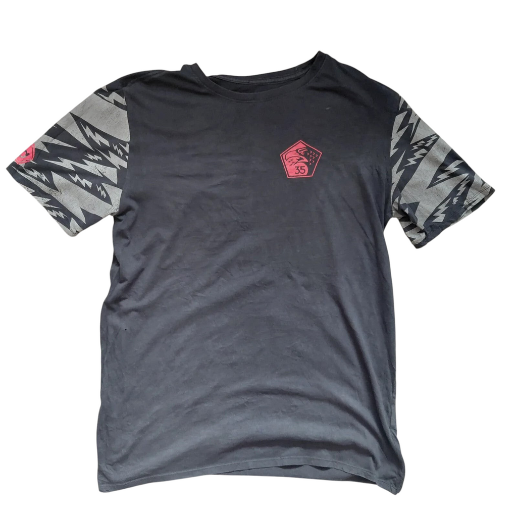 My Store Nike black cotton t-shirt with 35th Squadron eagle chest graphic and patterned lightning bolt sleeves