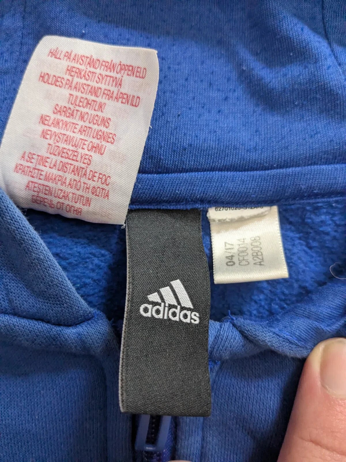 My Store blue adidas zip hoodie interior brand label and care tag detail