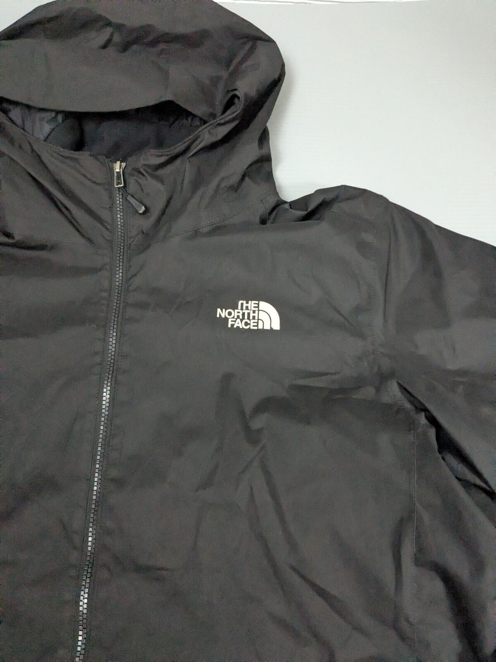 The North Face black hooded jacket