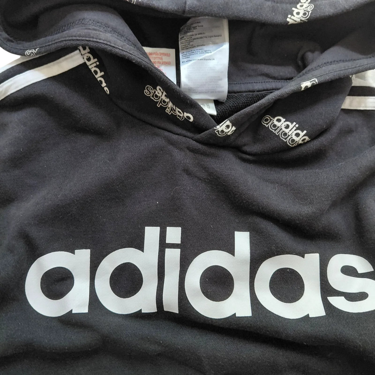 My Store black adidas pullover hoodie for youth with white logo and branded drawstring detail