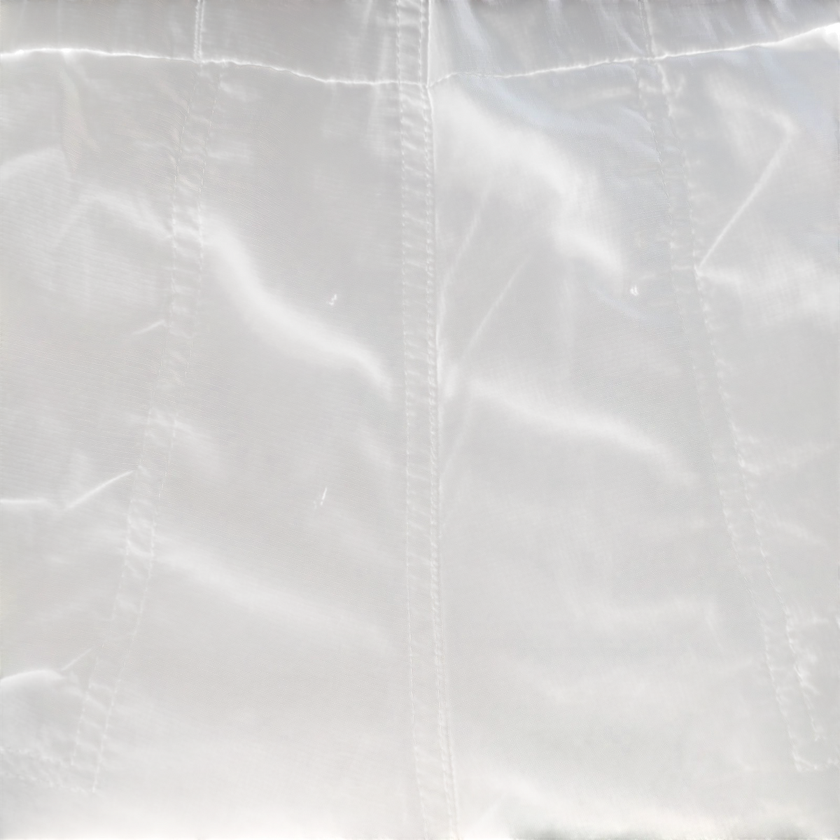 My Store beige Columbia Omni-Shade ripstop nylon cargo shorts fabric texture with visible stitching detail